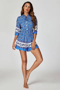 Blauer Boho-Playsuit mit Blumendruck und Knöpfen